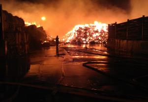 Some of the bales ablaze last night at the Smurfit Kappa site in Birmingham (photo: West Midlands Fire Service)